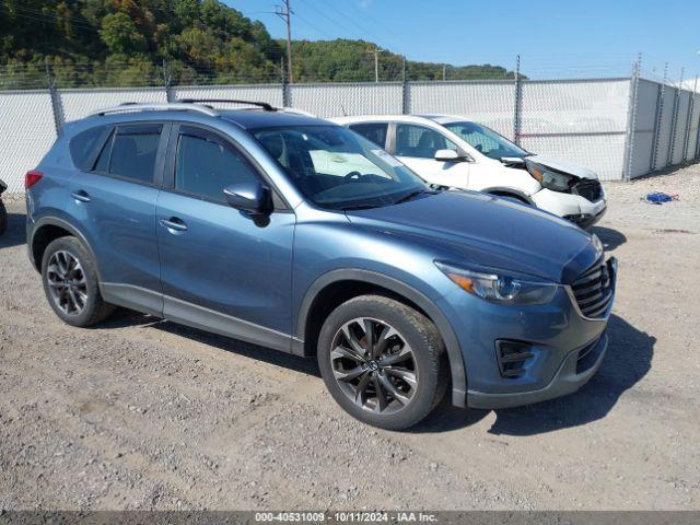  Salvage Mazda Cx