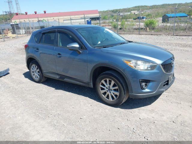  Salvage Mazda Cx